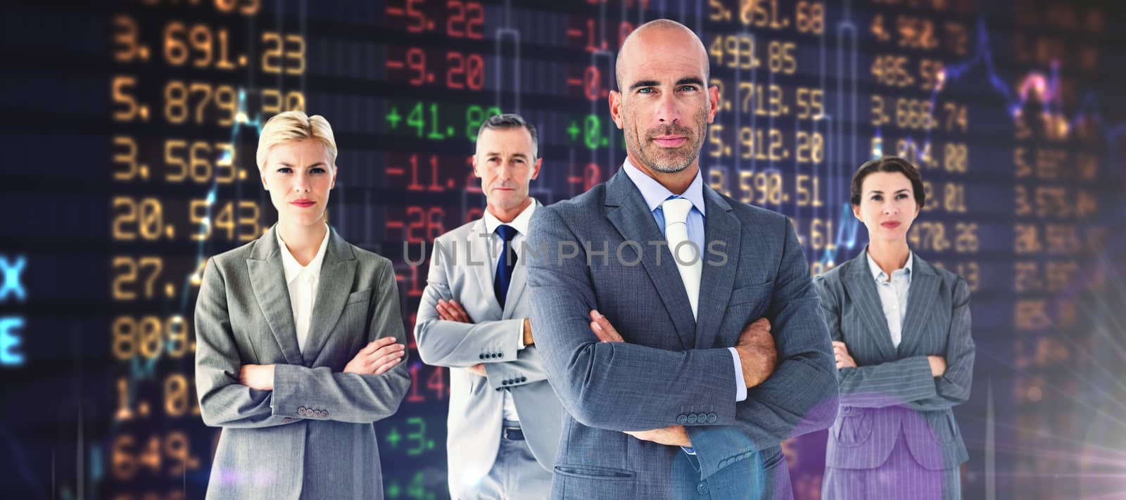 Business colleagues smiling at camera against stocks and shares