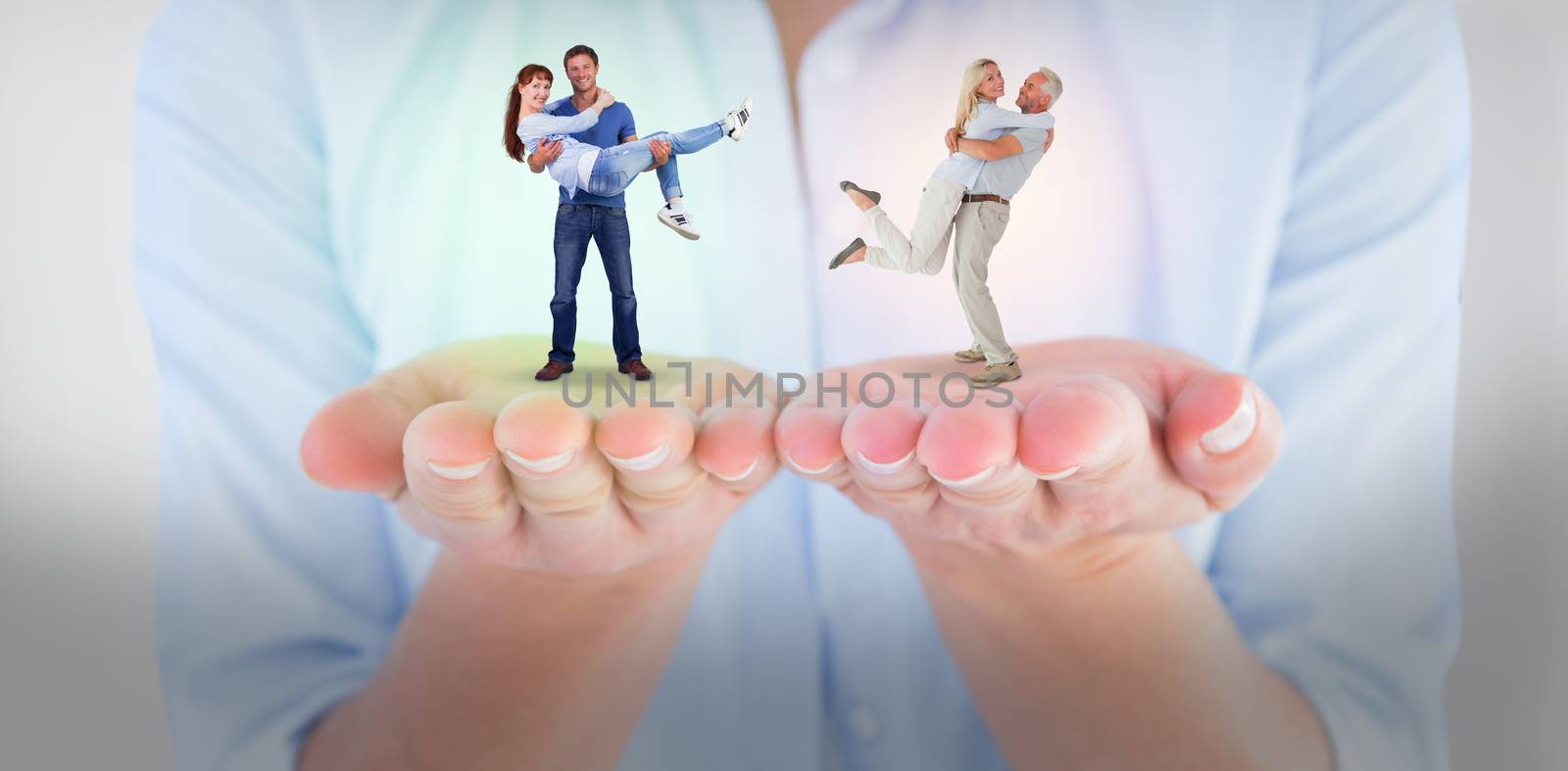 Man lifting up his girlfriend against turning cogs