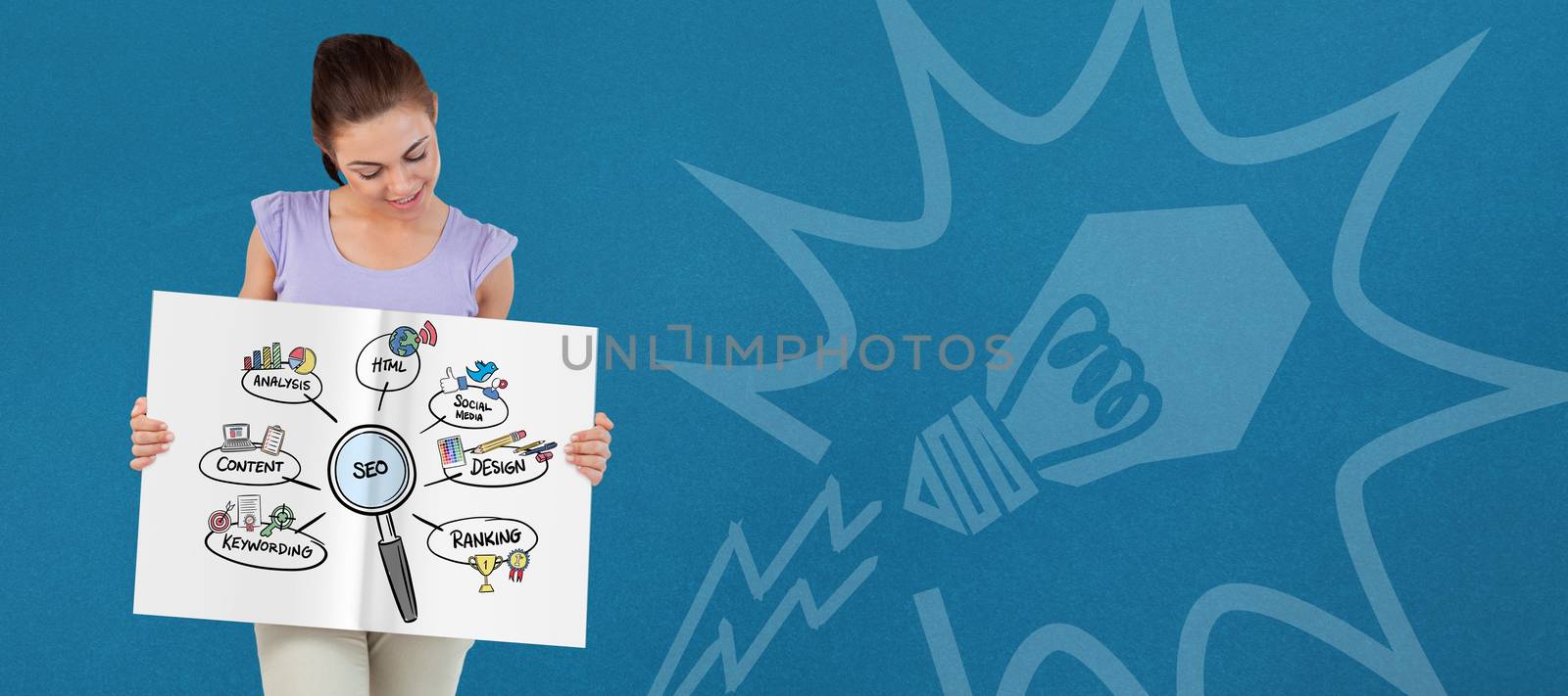 Composite image of pretty girl showing a book by Wavebreakmedia