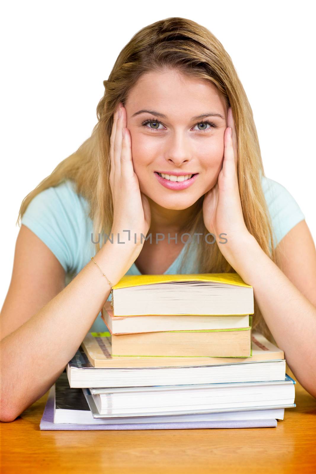 Portrait of female student in library against white background with vignette