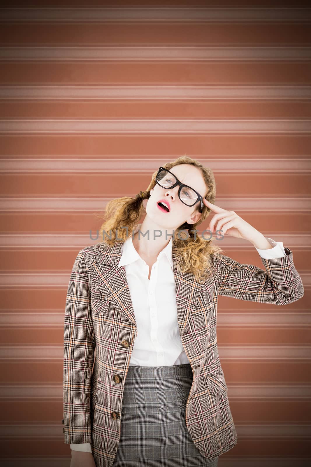 Composite image of geeky hipster thinking with finger on temple by Wavebreakmedia