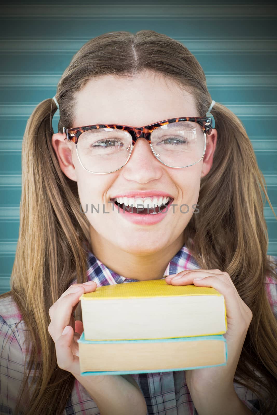 Geeky hipster smiling at camera against background
