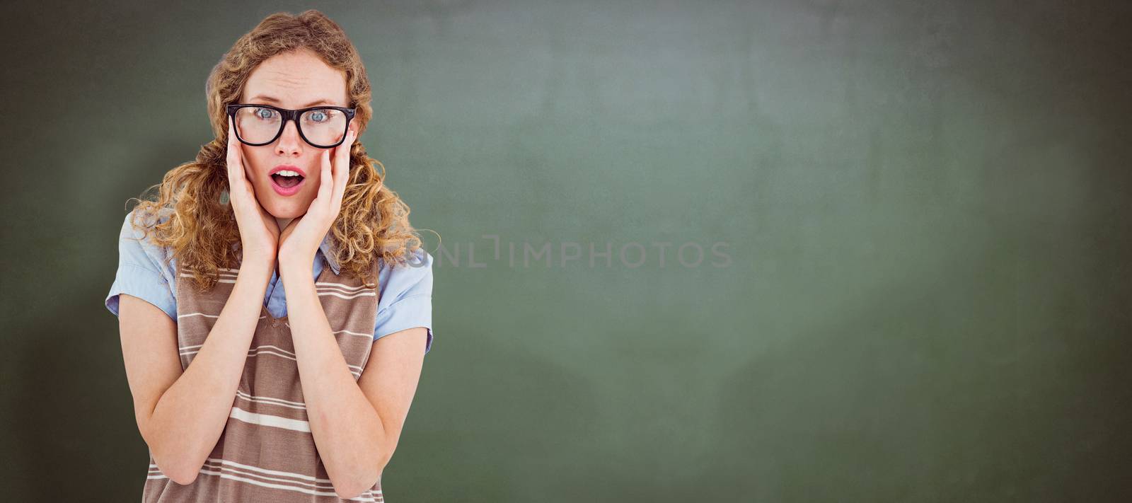 Composite image of geeky hipster woman putting her fingers in her ears by Wavebreakmedia