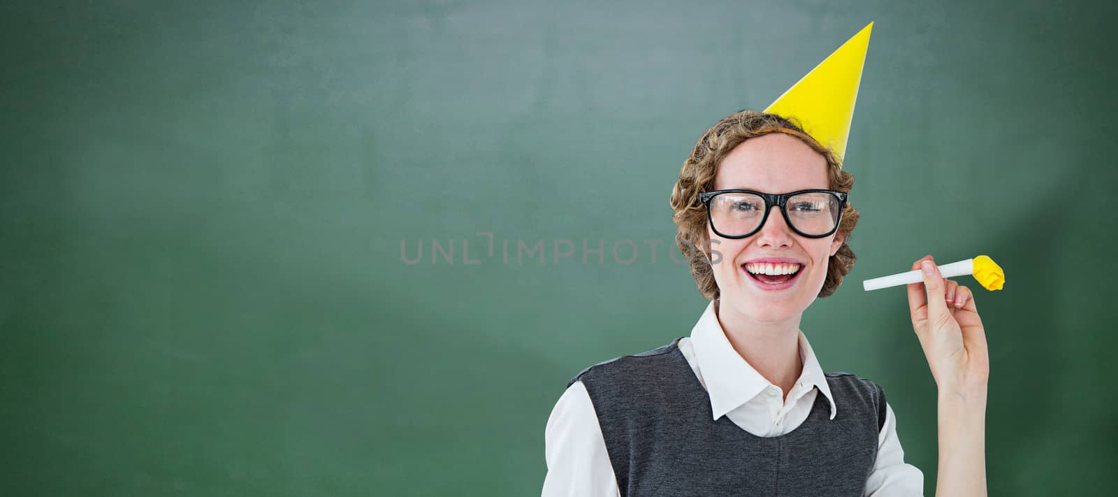 Composite image of geeky hipster in party hat with horn by Wavebreakmedia