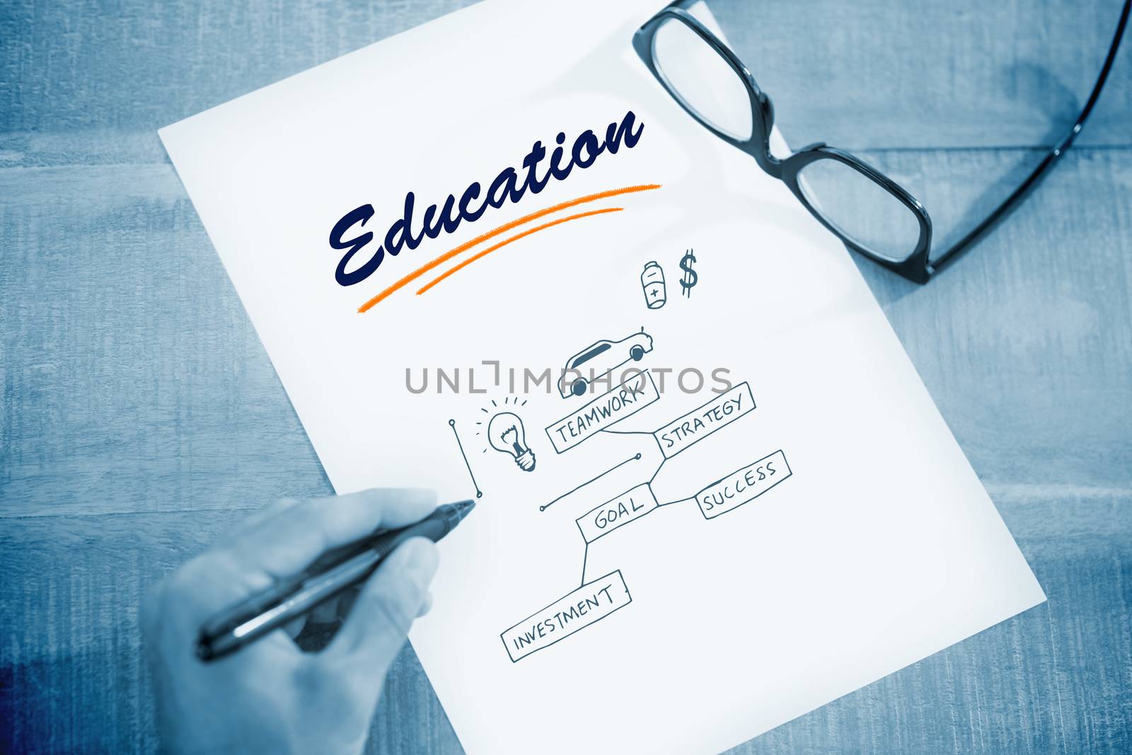 The word education and left hand writing on white page on working desk against business concept vector