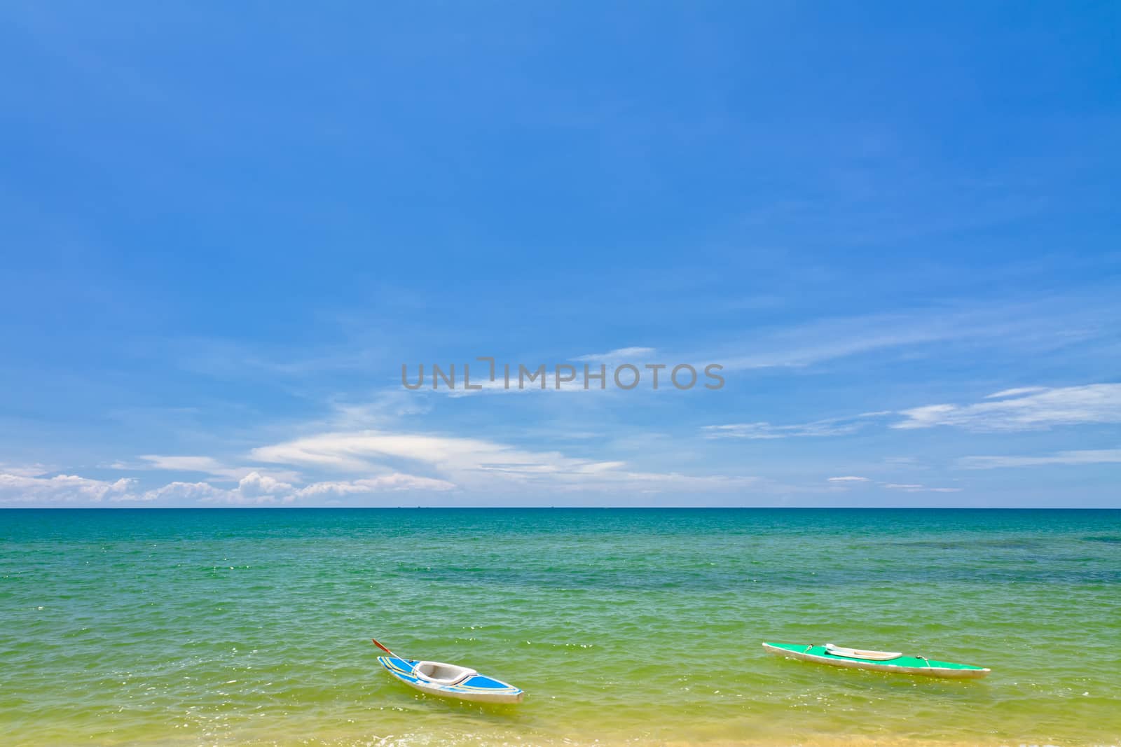 Sand beach with canoes in Phu Quoc close to Duong Dong, Vietnam