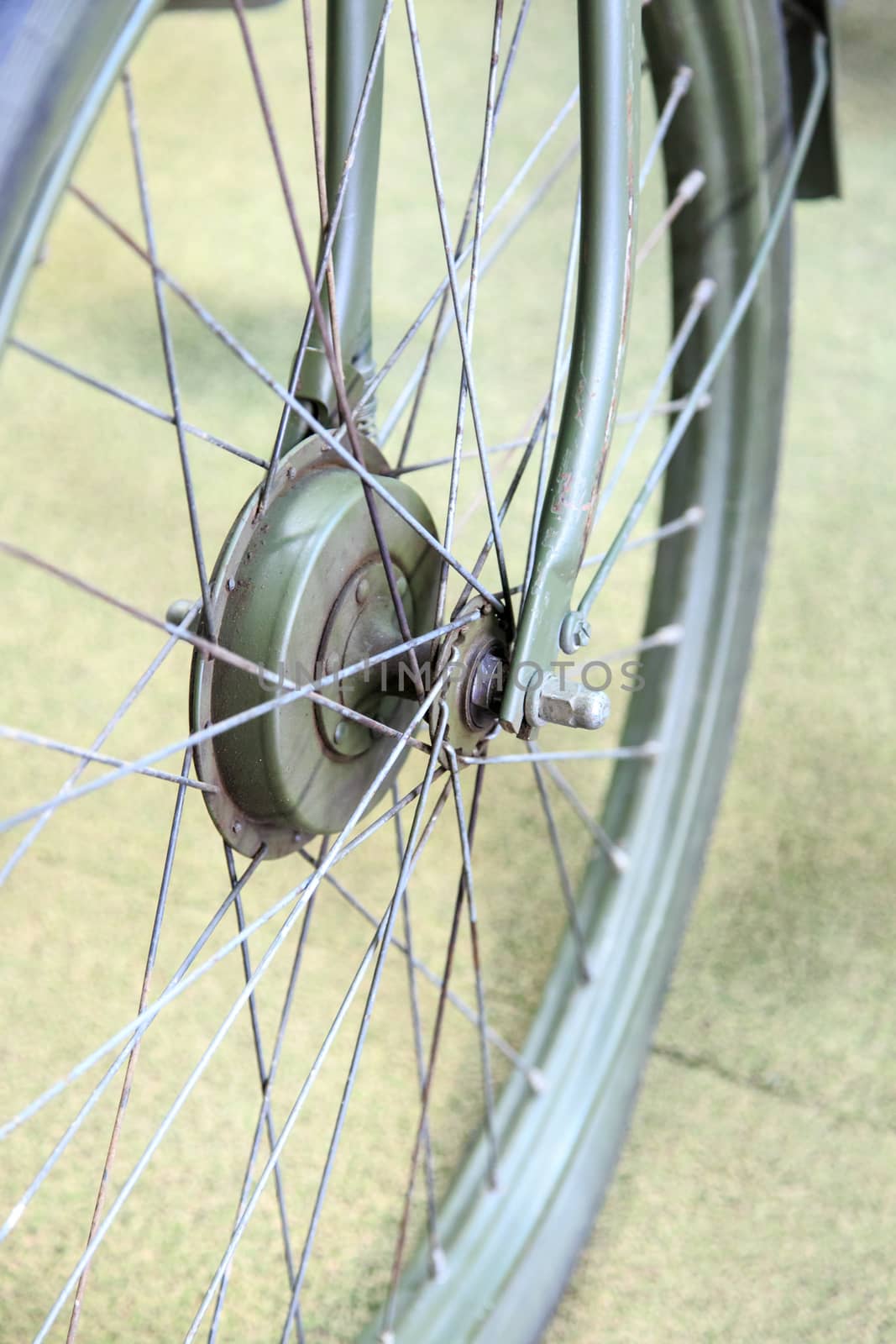 Close up detailed view of steering wheelsand rims of vintage bicycle.