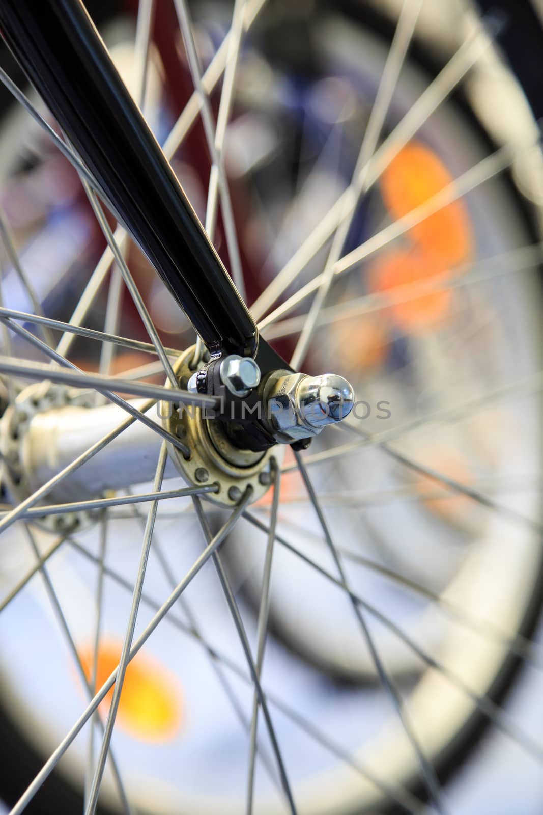 Close up detailed view of steering wheelsand rims of vintage bicycle.