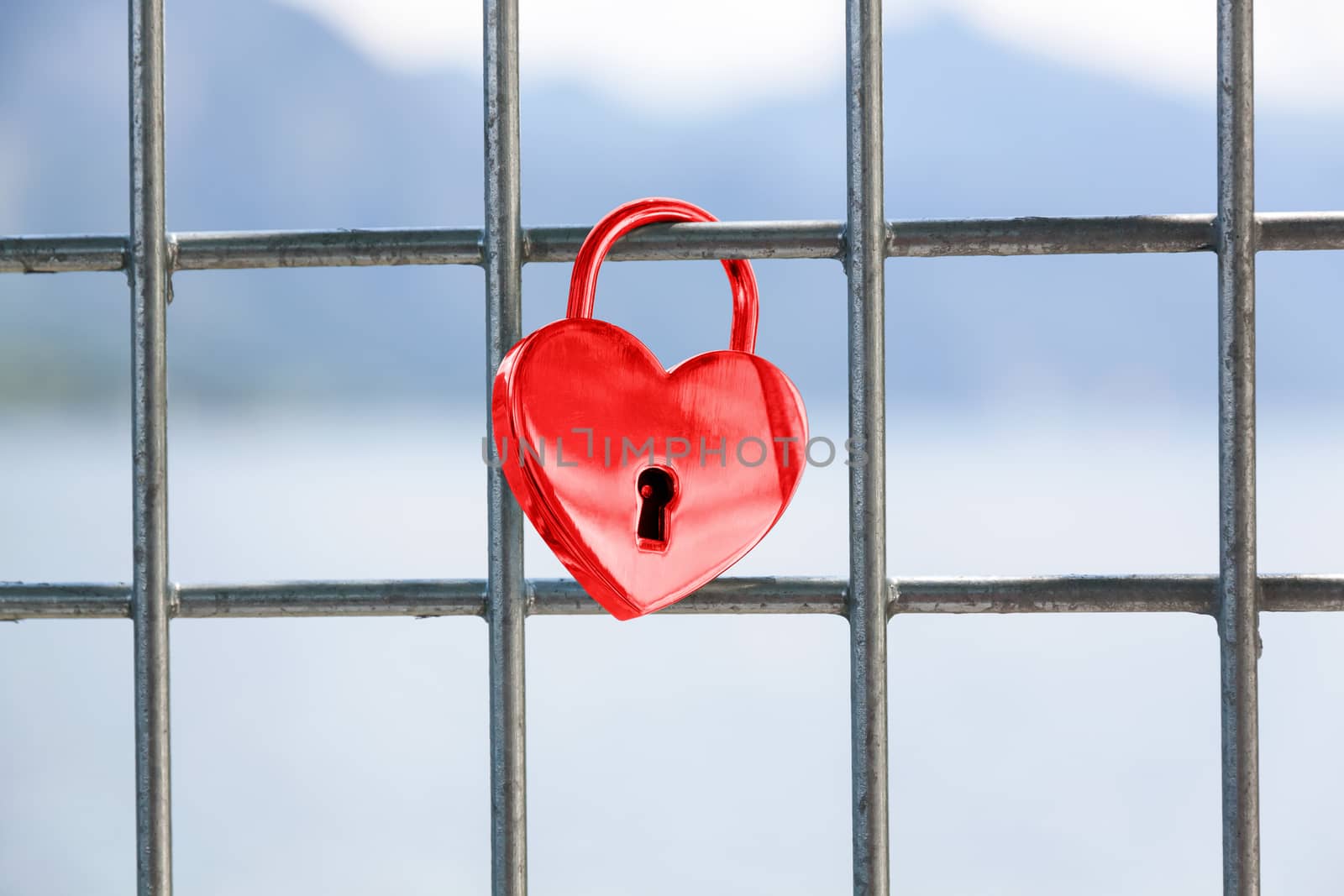 Heart shaped love padlock - beautiful wedding day custom. Shallow depth of field