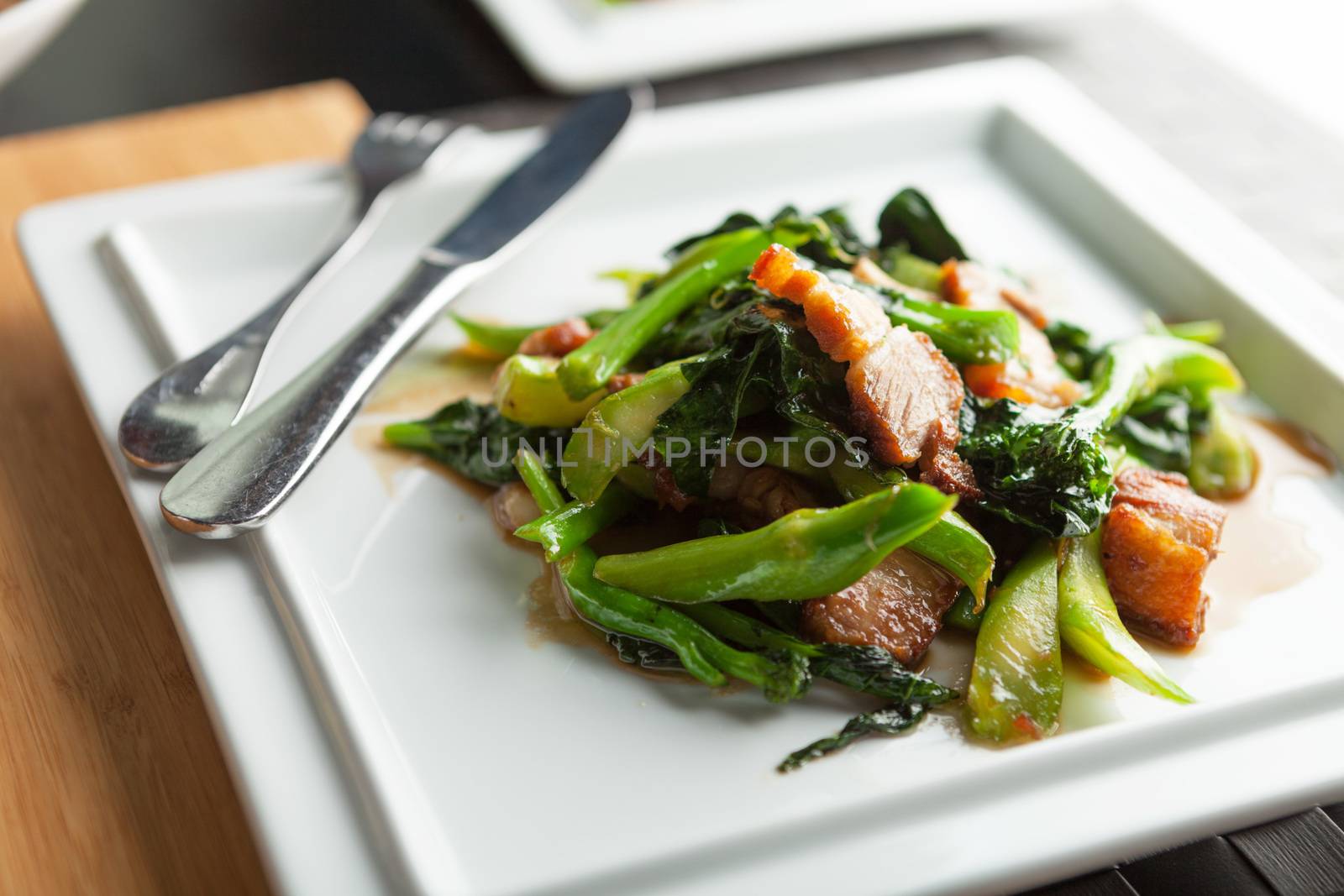 Thai style crispy pork dish  by graficallyminded