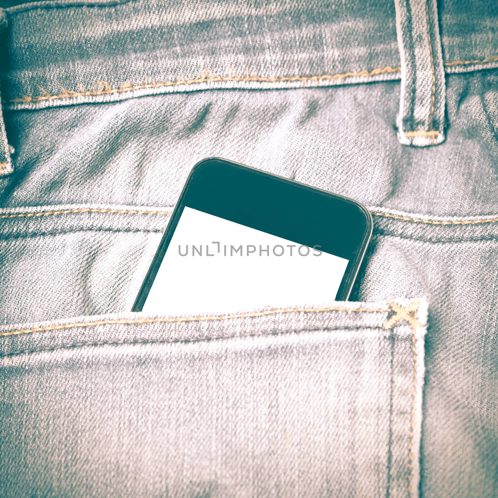 smart phone in jean pocket pants retro vintage style