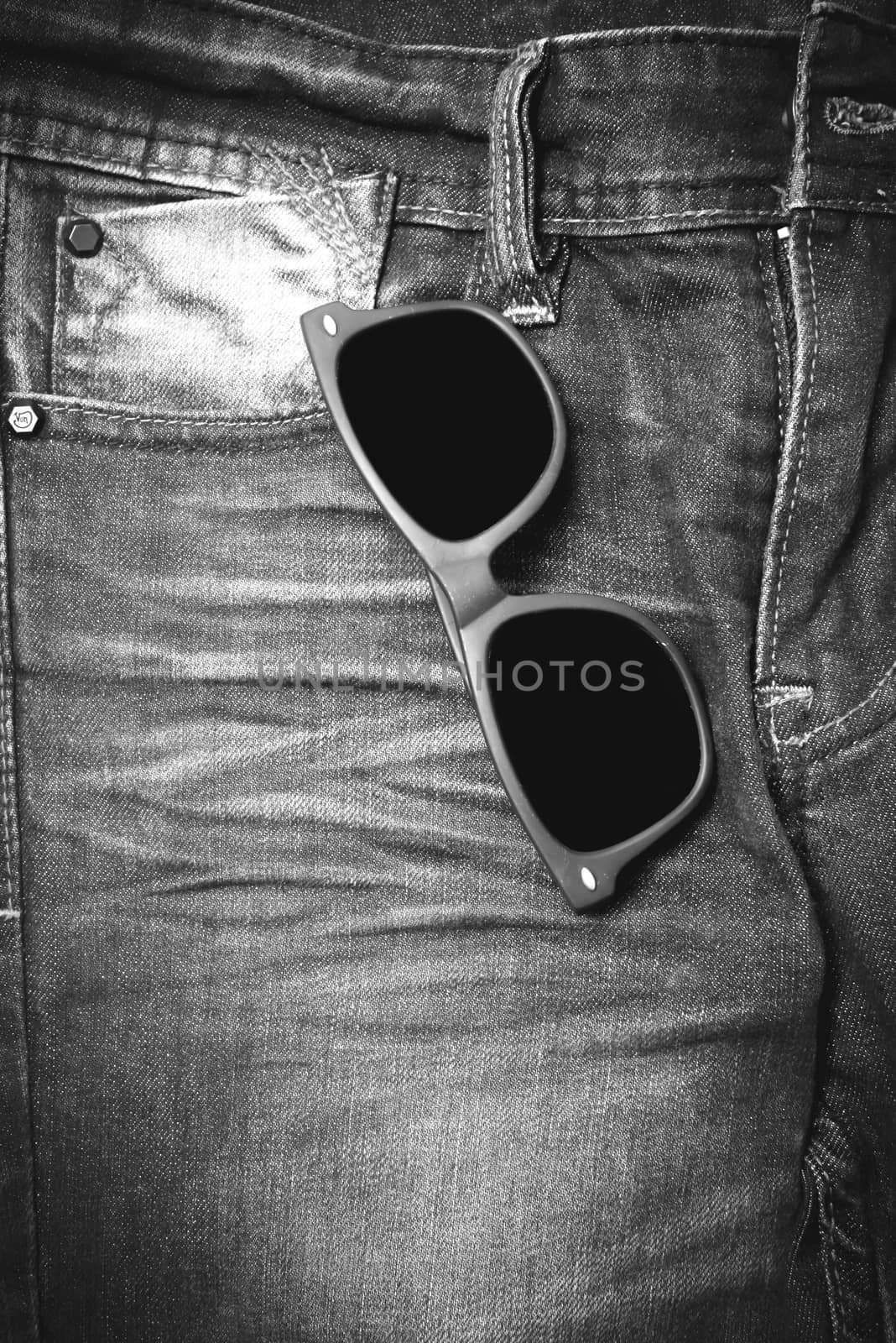 sunglasses on jean pants black and white tone color style