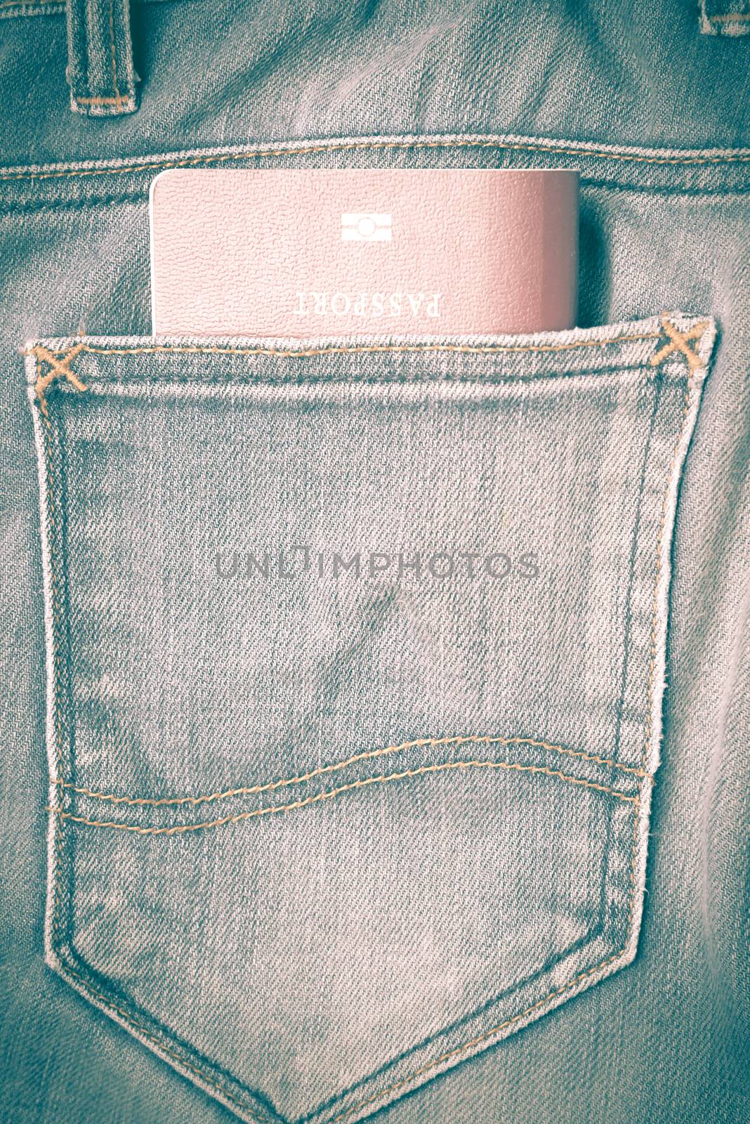 passport in jean pants retro vintage style