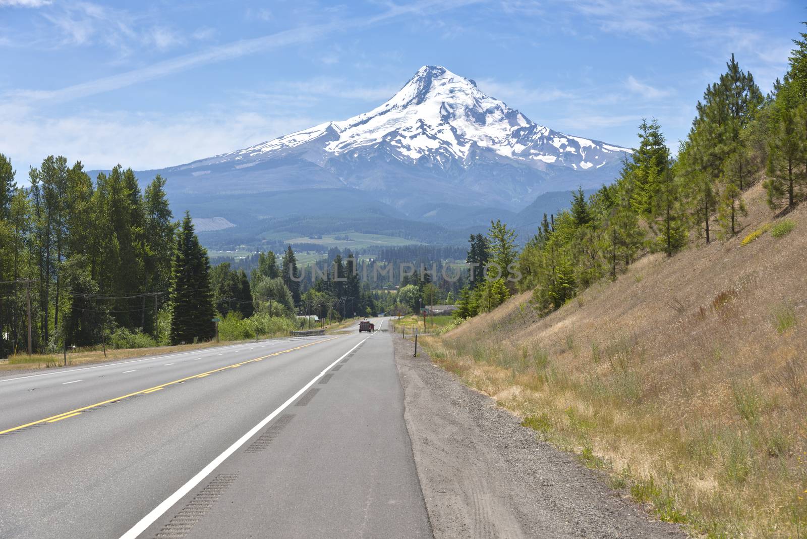 Country road and Mt. Hood valley Oregon. by Rigucci