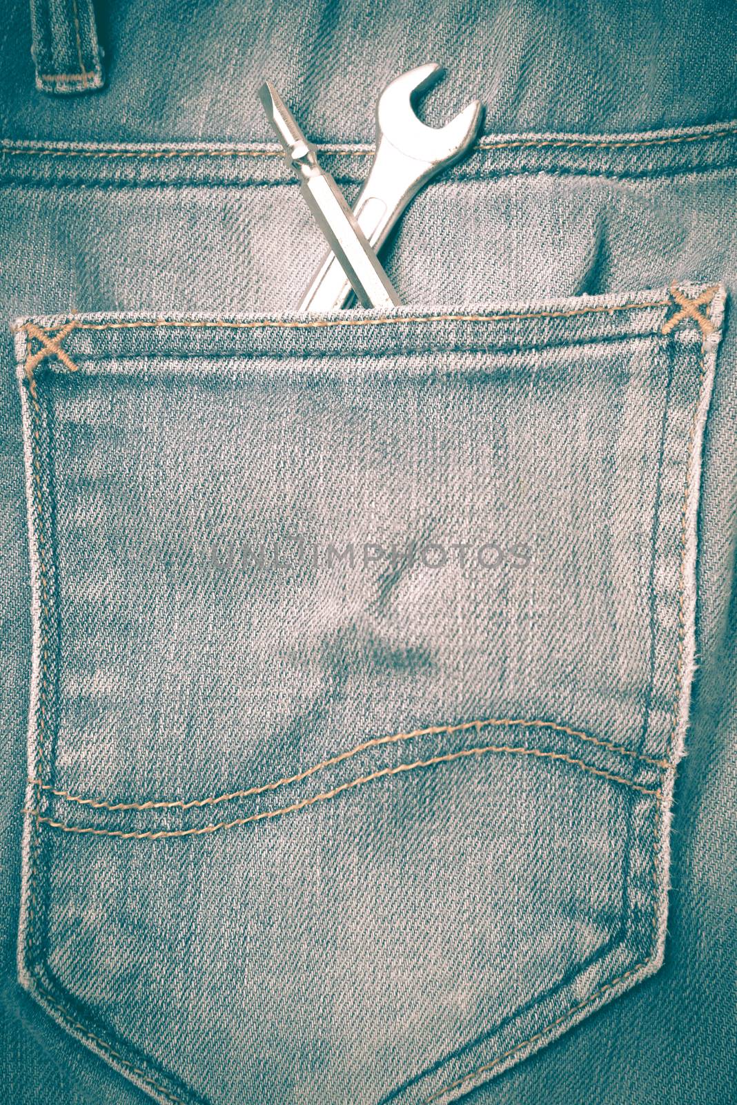 wrench tools in jean pants retro vintage style