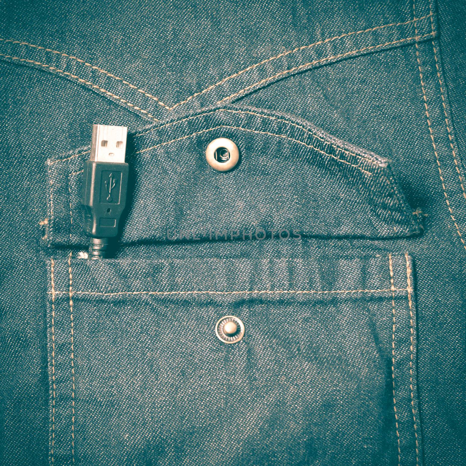 usb cable in jean pocket retro vintage style