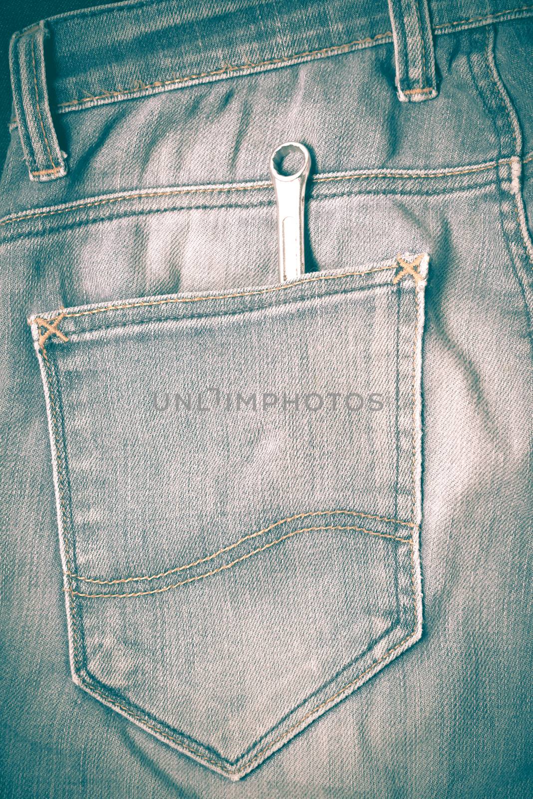 screwdriver in jean pocket pants retro vintage style