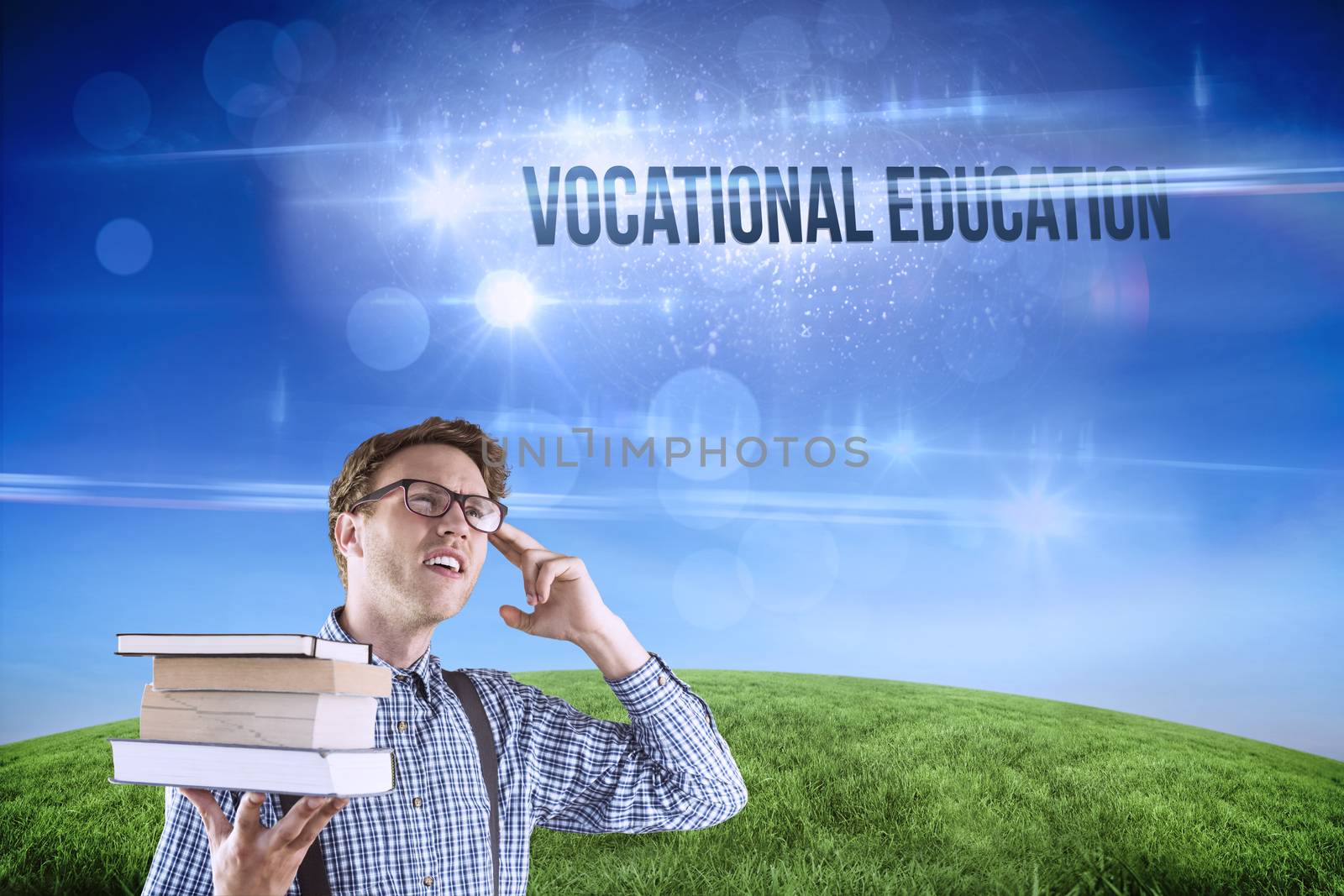 The word vocational education and geeky student holding a pile of books against green hill under blue sky