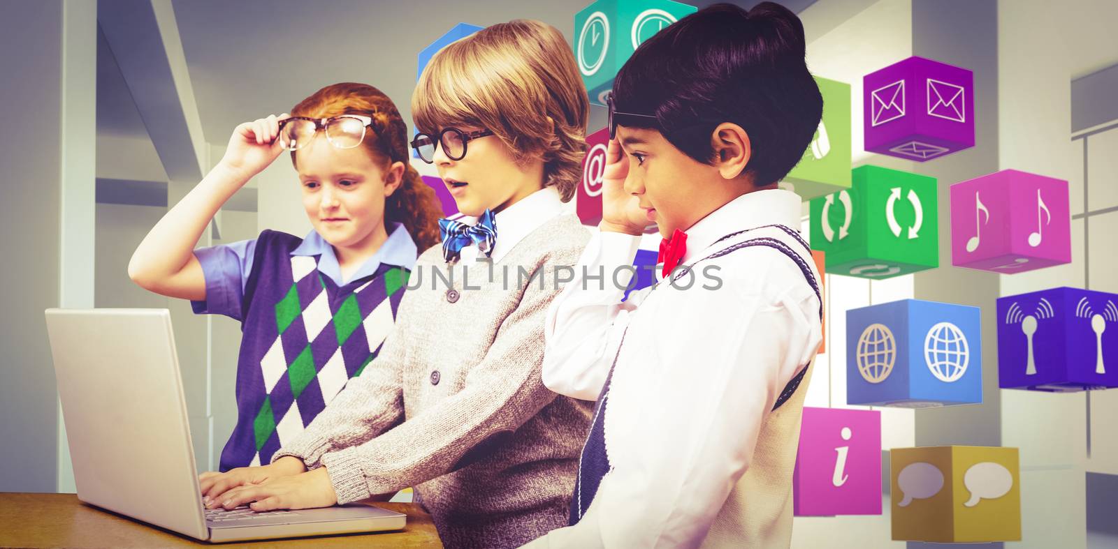 Pupils using laptop against white room with screen