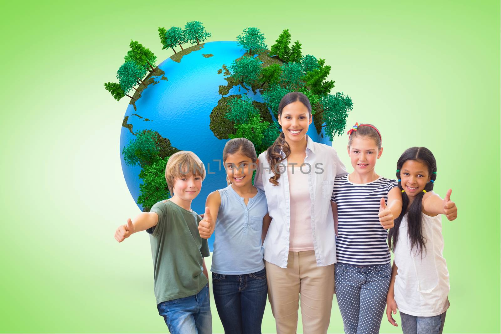 Cute pupils and teacher smiling at camera in computer class  against green vignette