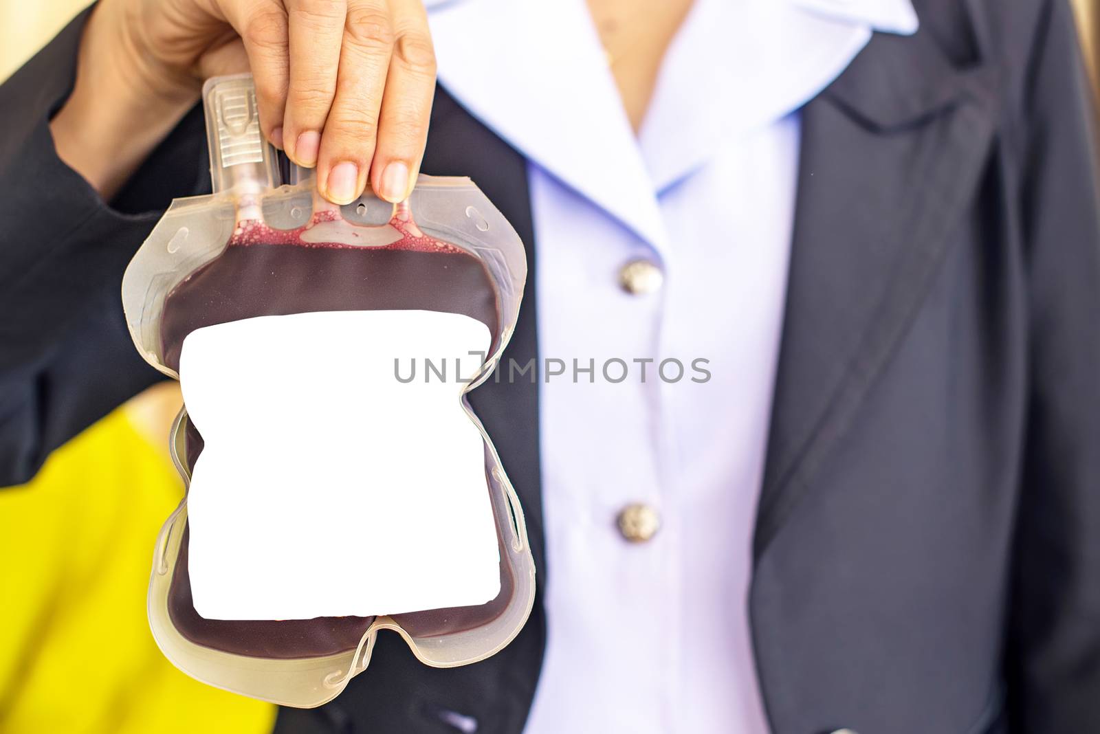 Human blood in hand ,attending to a blood donor