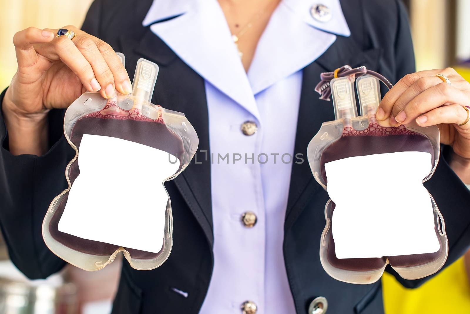 Human blood in hand ,attending to a blood donor