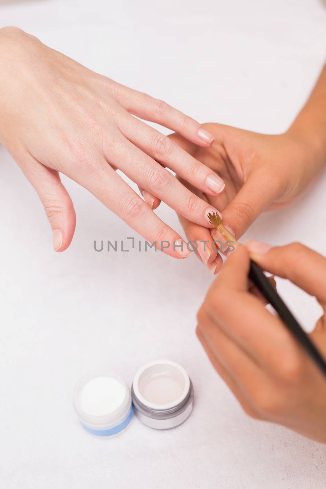 Woman getting a hand massage at the beauty salon