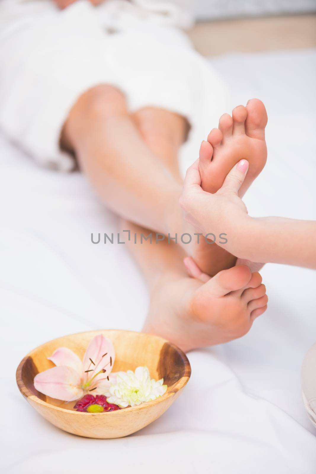 Woman receiving a foot massage at the beauty salon