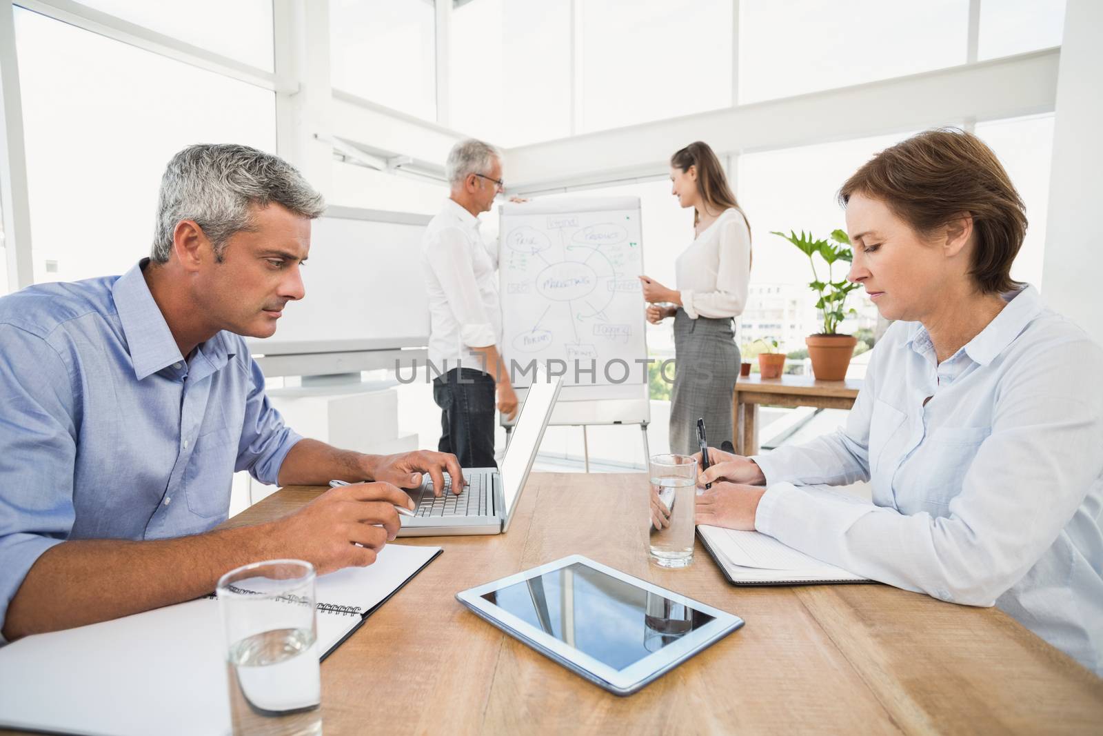 Business people having a meeting by Wavebreakmedia