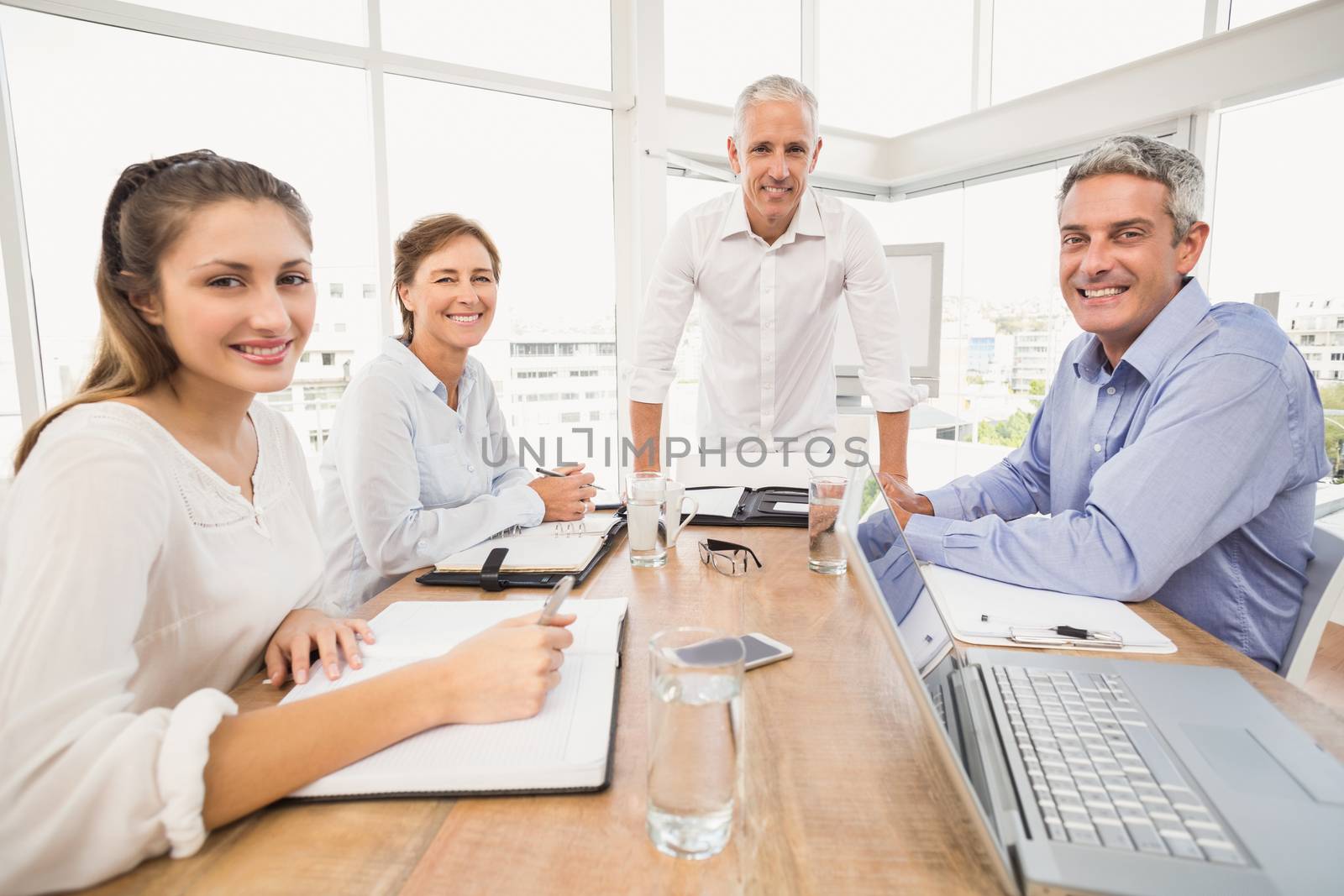 Portrait of smiling business people during a presentation in the office