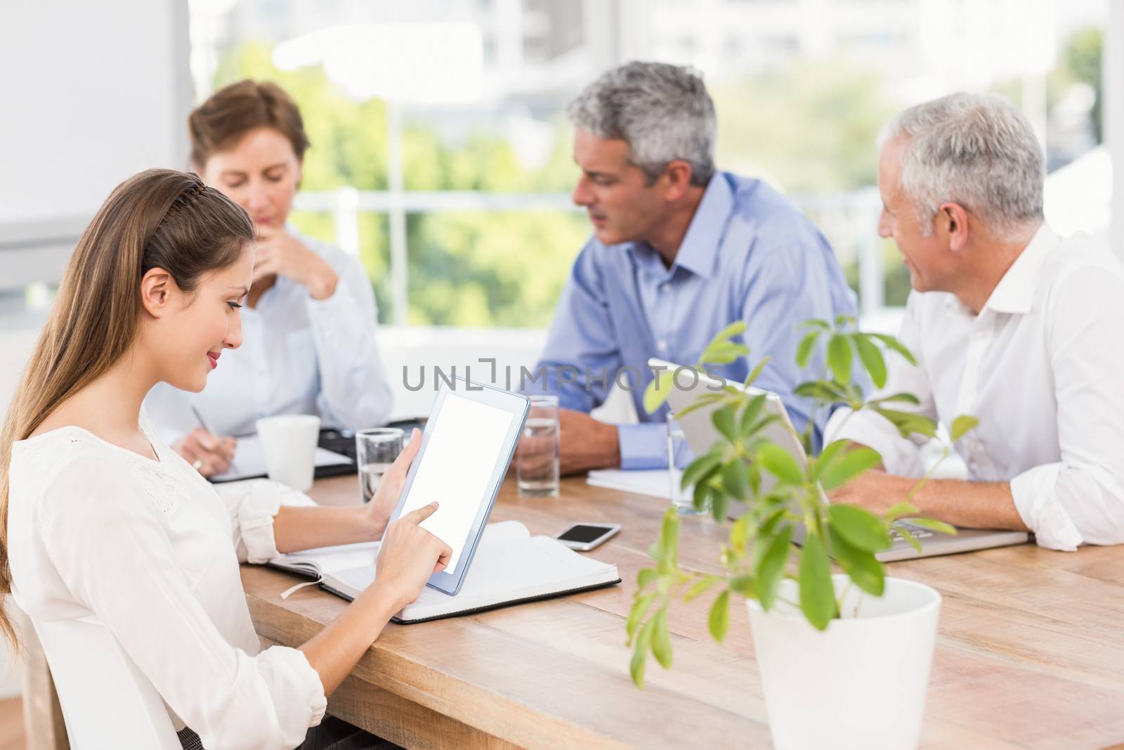 Business people having a meeting by Wavebreakmedia