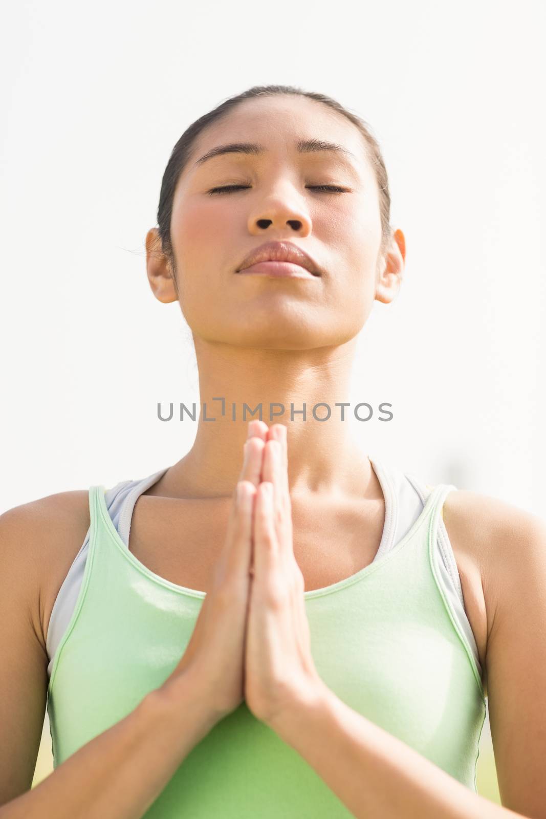 Peaceful sporty woman doing yoga by Wavebreakmedia