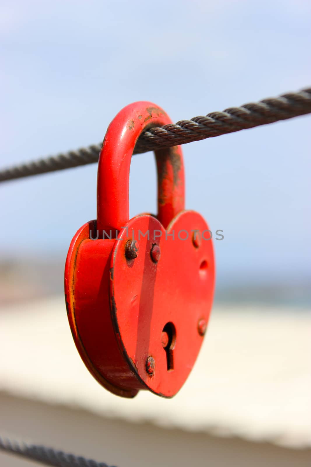 Love Locks in San Remo Beach, Italia. Heart-shaped padlock
for Valentine’s Day or wedding day