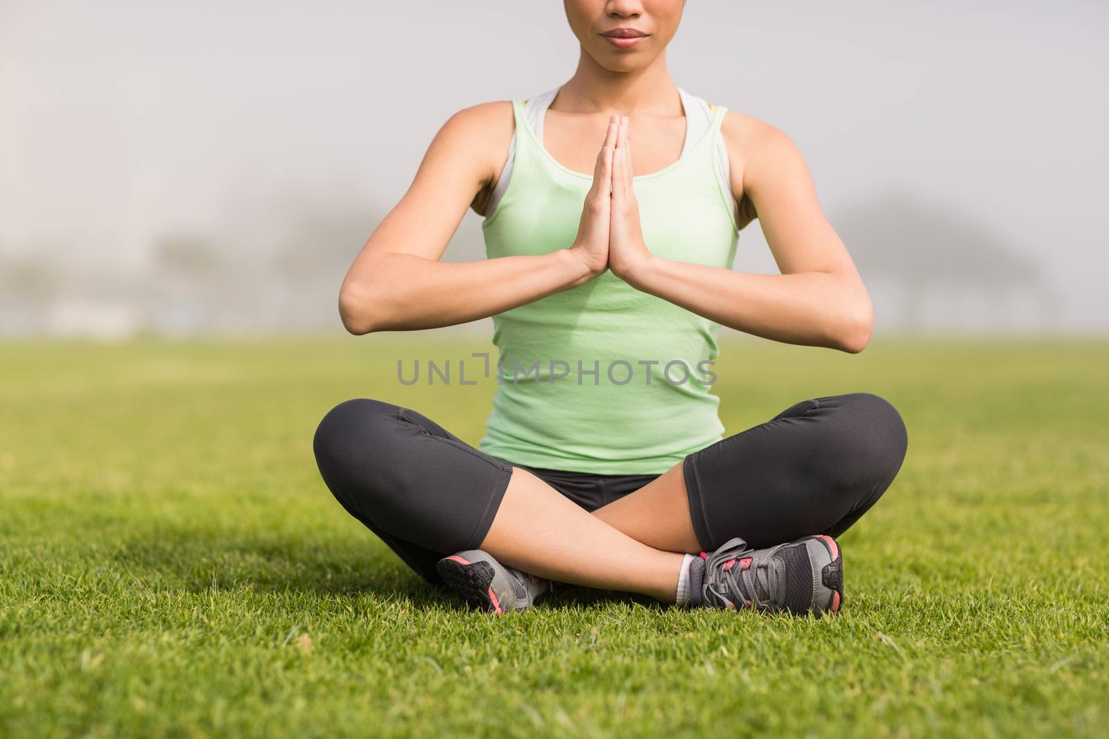 Peaceful sporty woman doing yoga by Wavebreakmedia