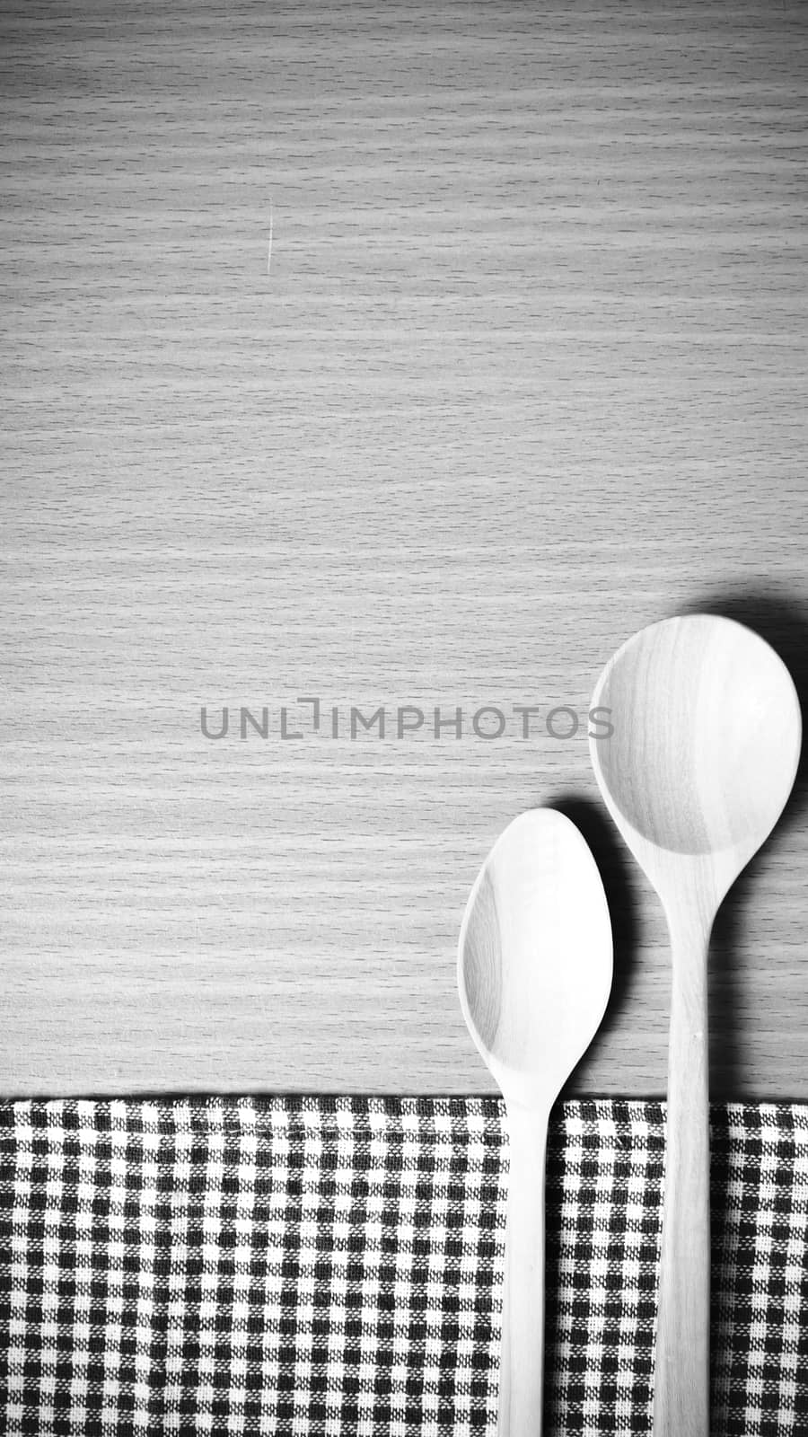 wood spoon and kitchen towel black and white color tone style by ammza12