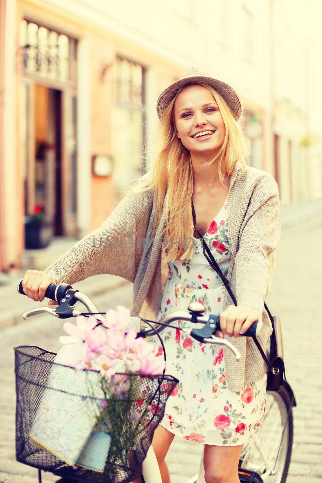 summer holidays, bikes, travel concept - attractive woman in hat with bicycle in the city