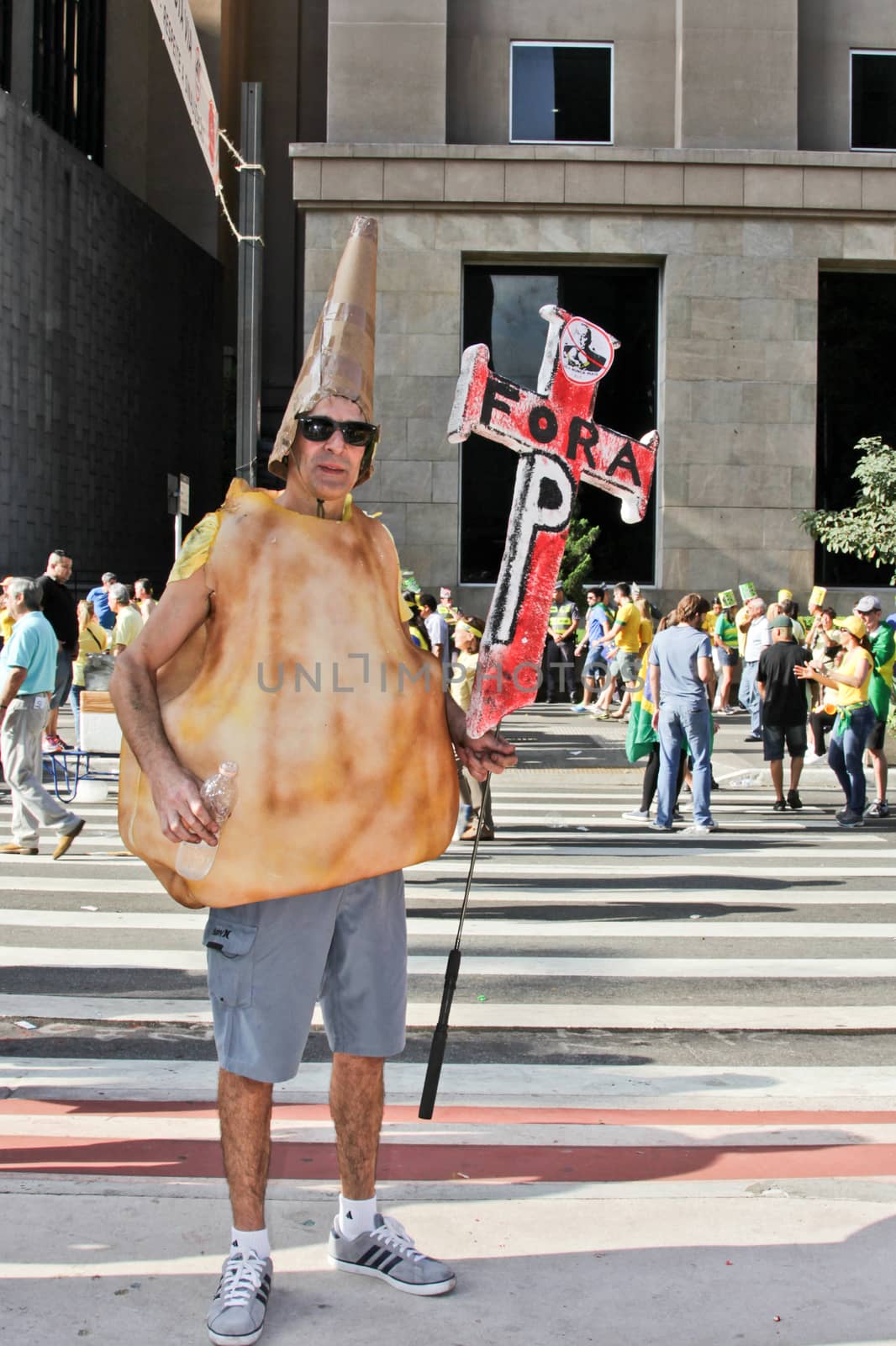 SAO PAULO, BRAZIL August 16, 2015: An unidentified man with costume in the protest against federal government corruption in Sao Paulo Brazil.