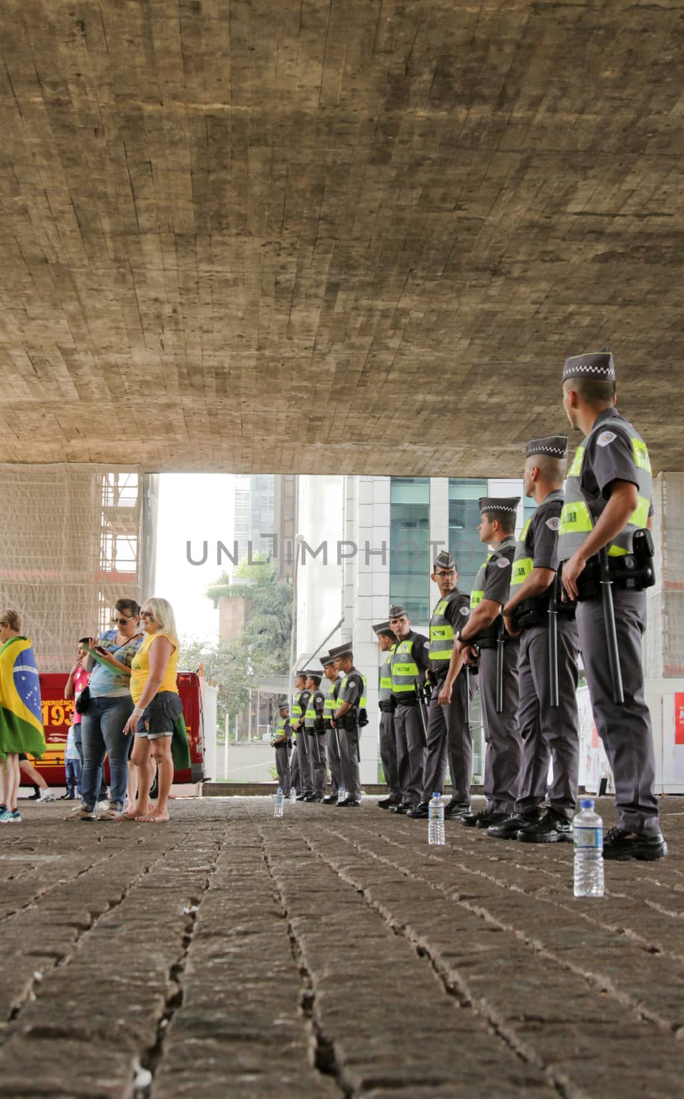 SAO PAULO, BRAZIL August 16, 2015: An unidentified group of cops take care of security in the protest against federal government corruption in Sao Paulo Brazil.