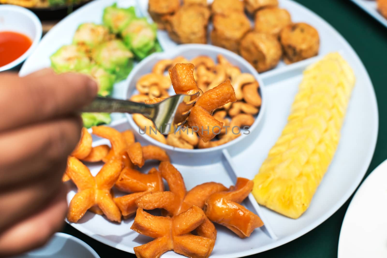 appetizer With Jock shell crab , hot dogs and pineapple - thai food