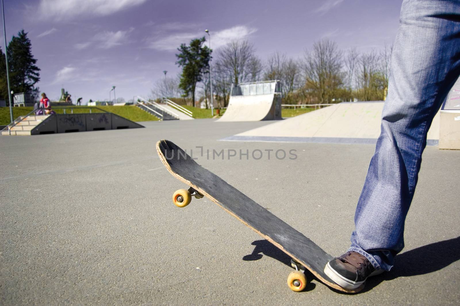 Skateboarder conceptual image. Picture of skateborad in skatepark.