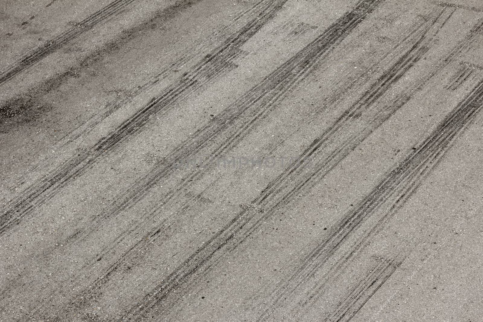 Background with tire marks on road track