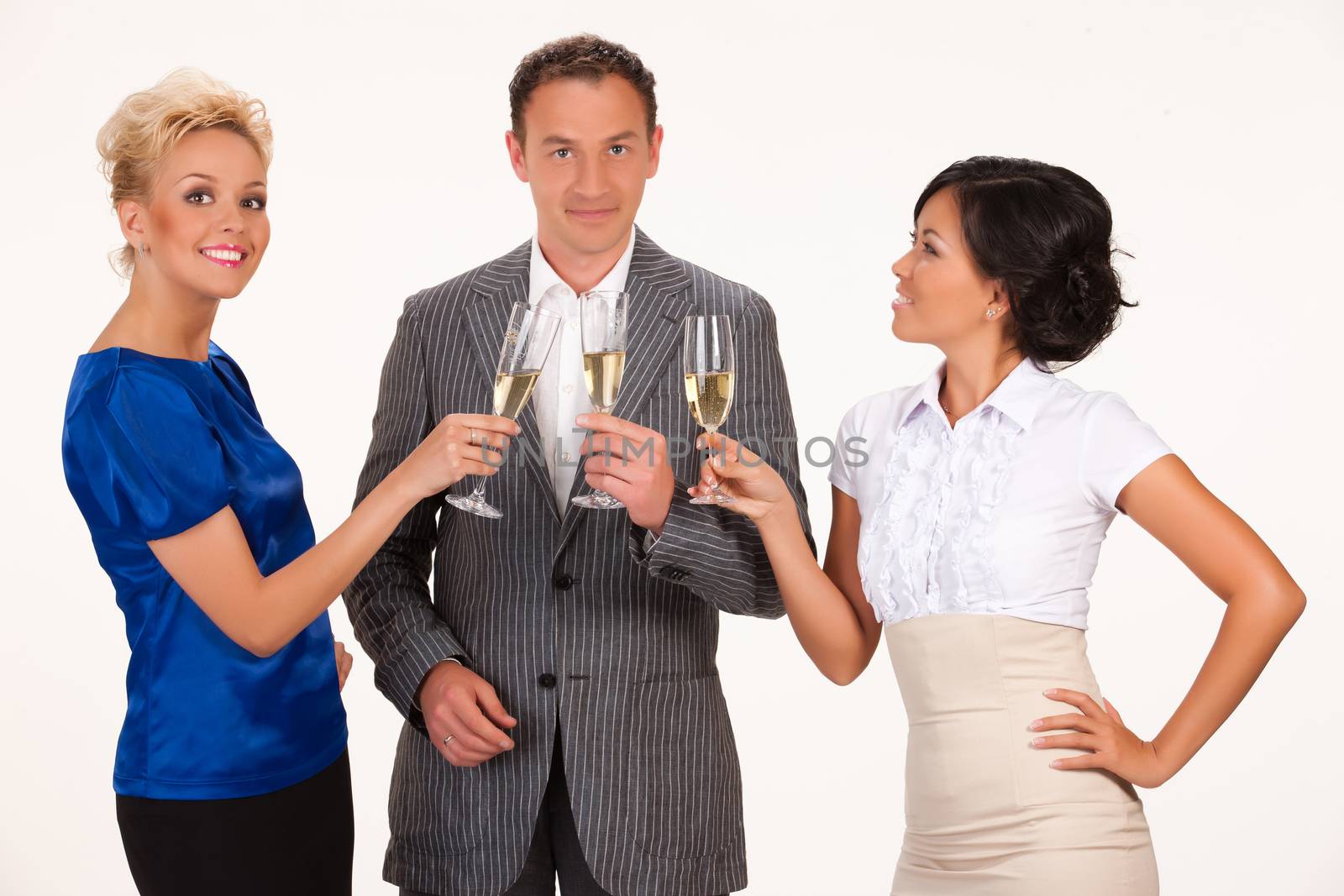 Young people drinking the wine from glasses on isolated background