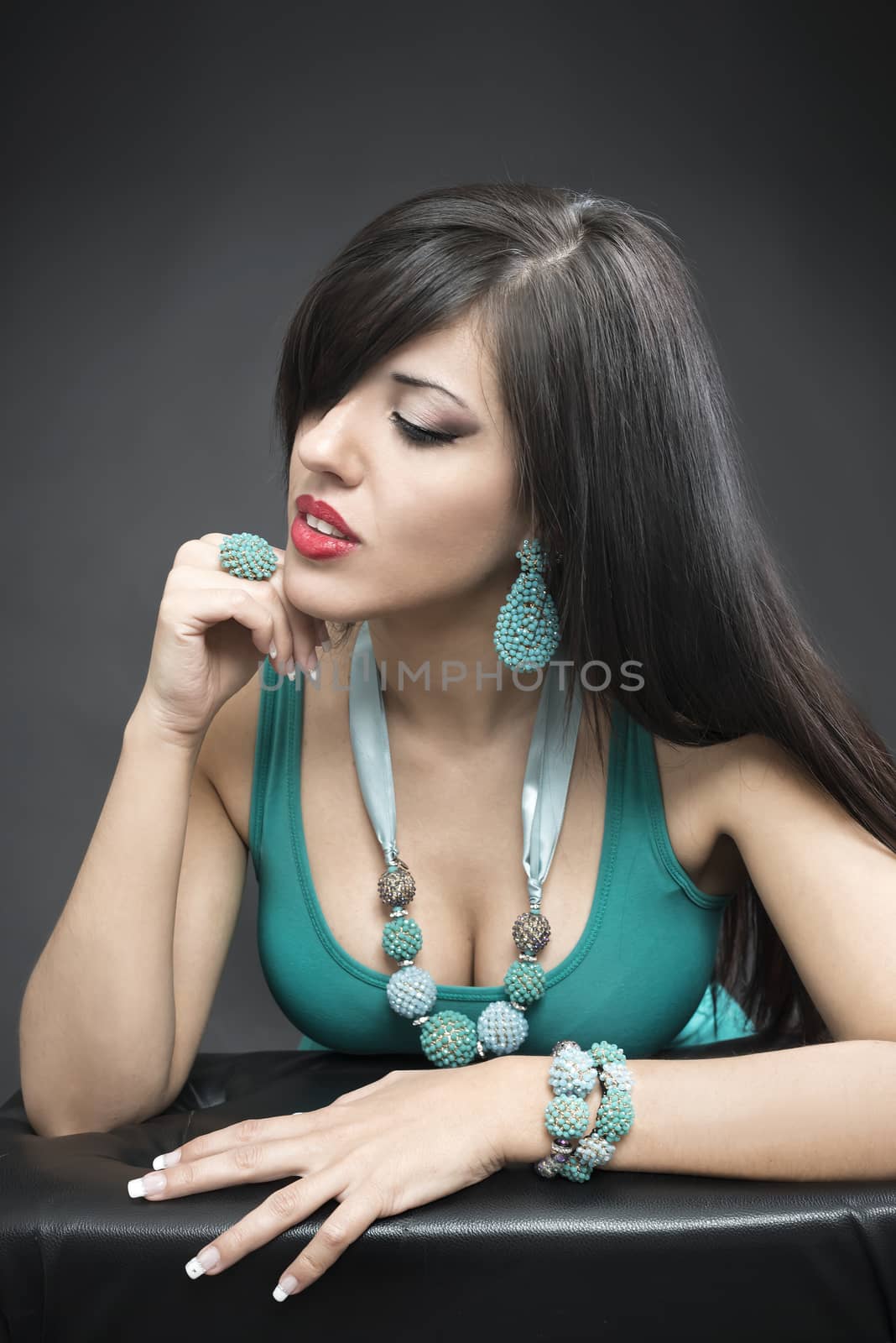 Portrait of the beautiful fashion woman with glamour accessory