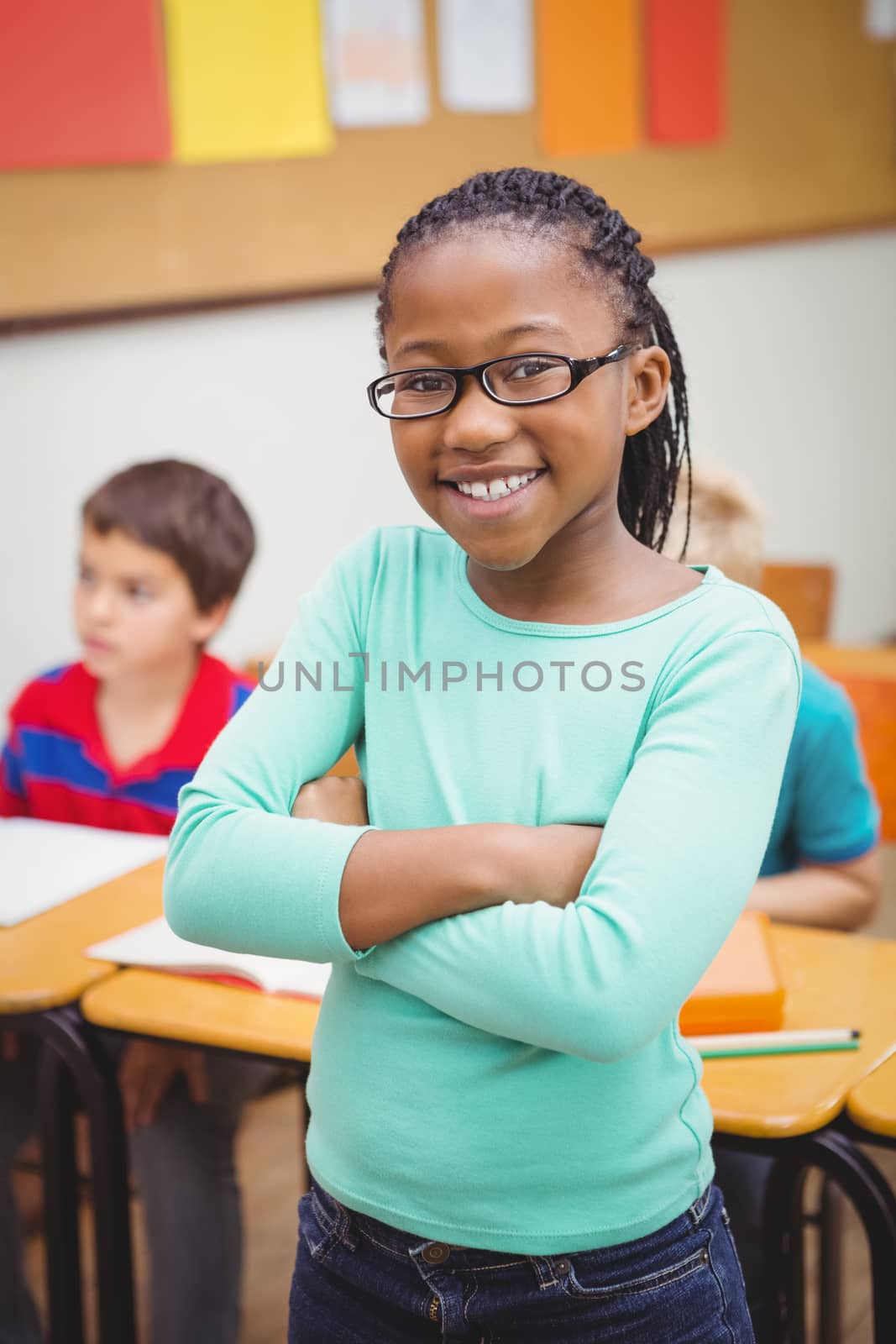 Smiling student looking at camera at the elementary school
