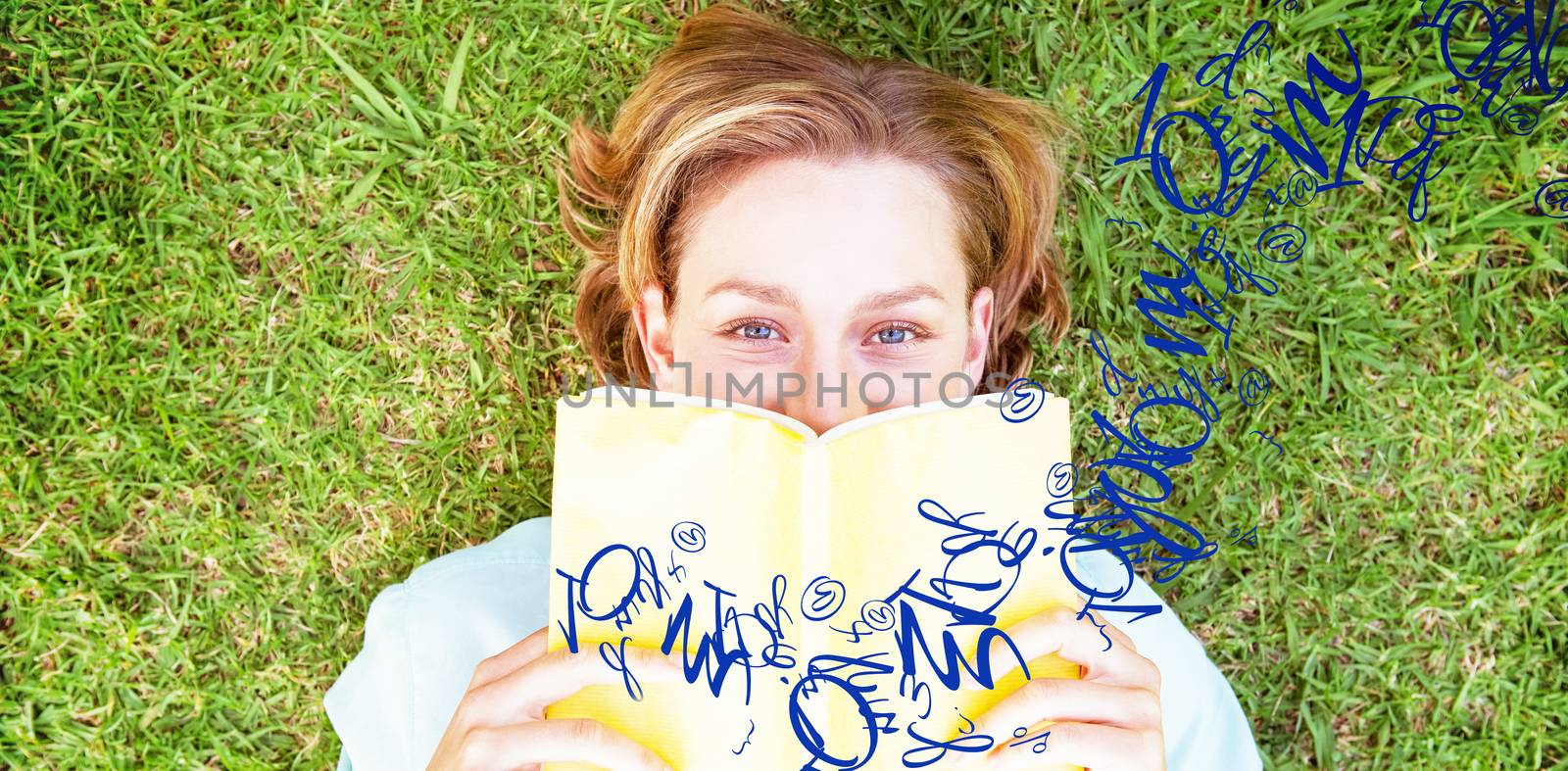 letter and number jumble against pretty woman reading book in park