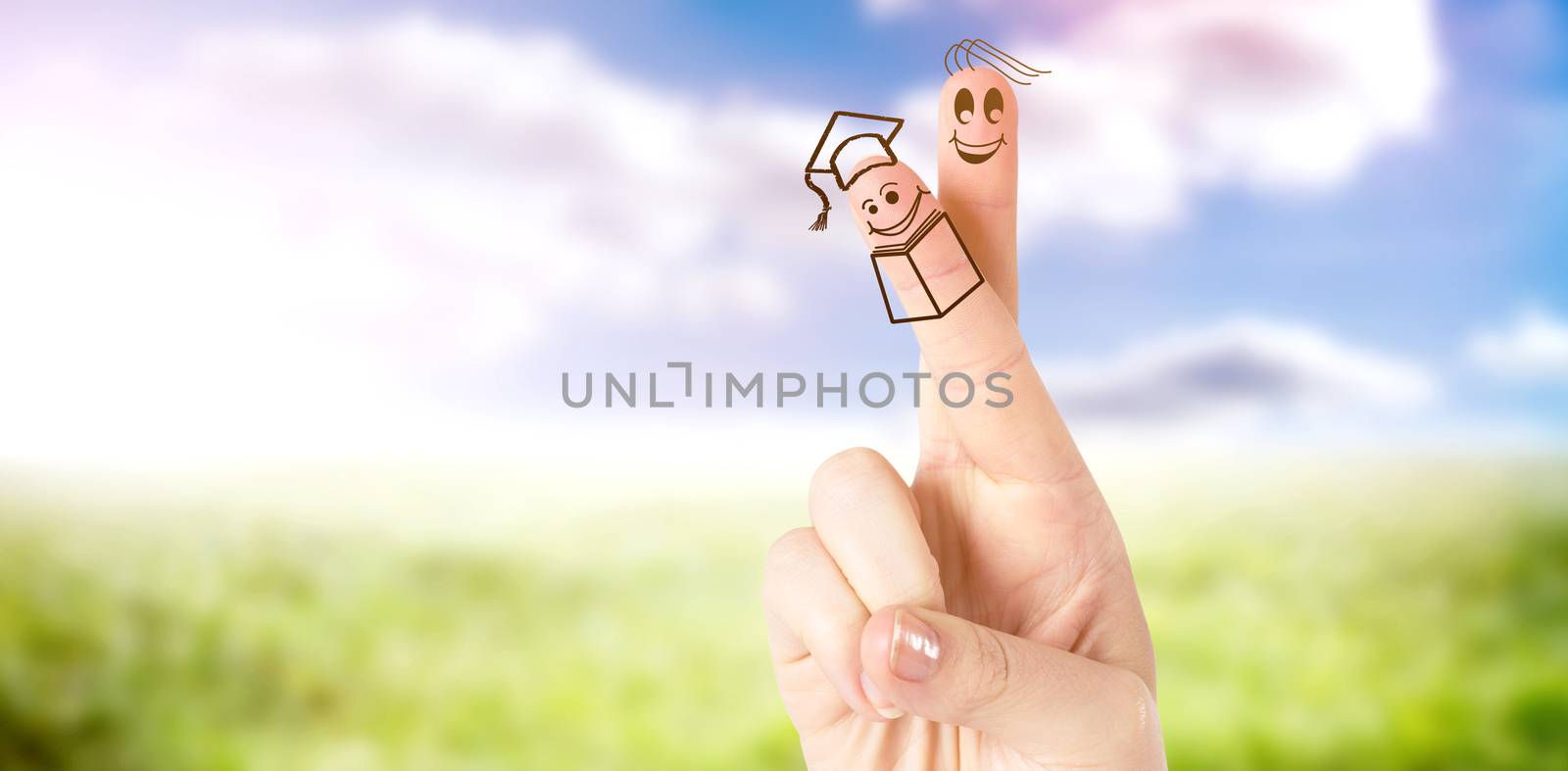 Fingers posed as students against sunny landscape