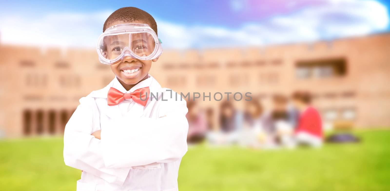 Pupil dressed up as scientist against students using laptop in lawn against college building