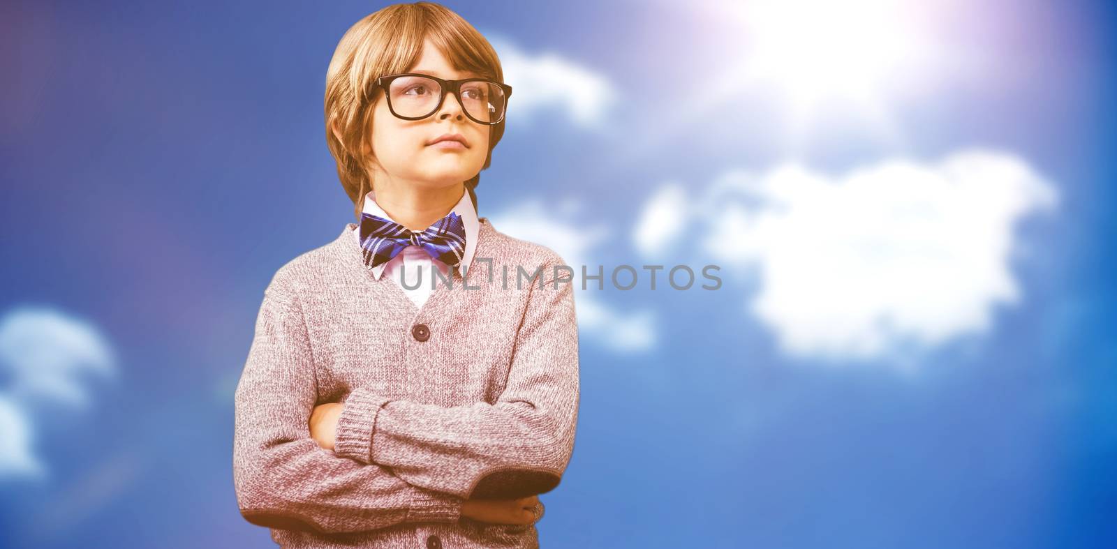 Cute pupil dressed up as teacher against bright blue sky with clouds