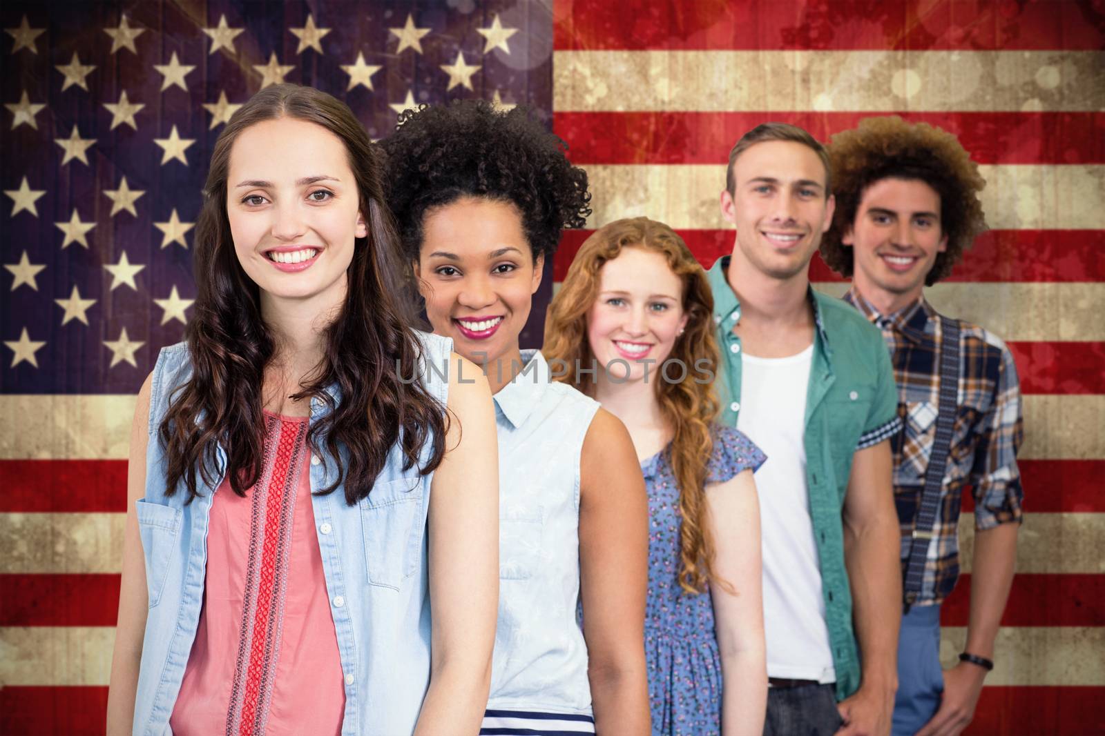 Confident and attractive fashion designers against usa flag in grunge effect