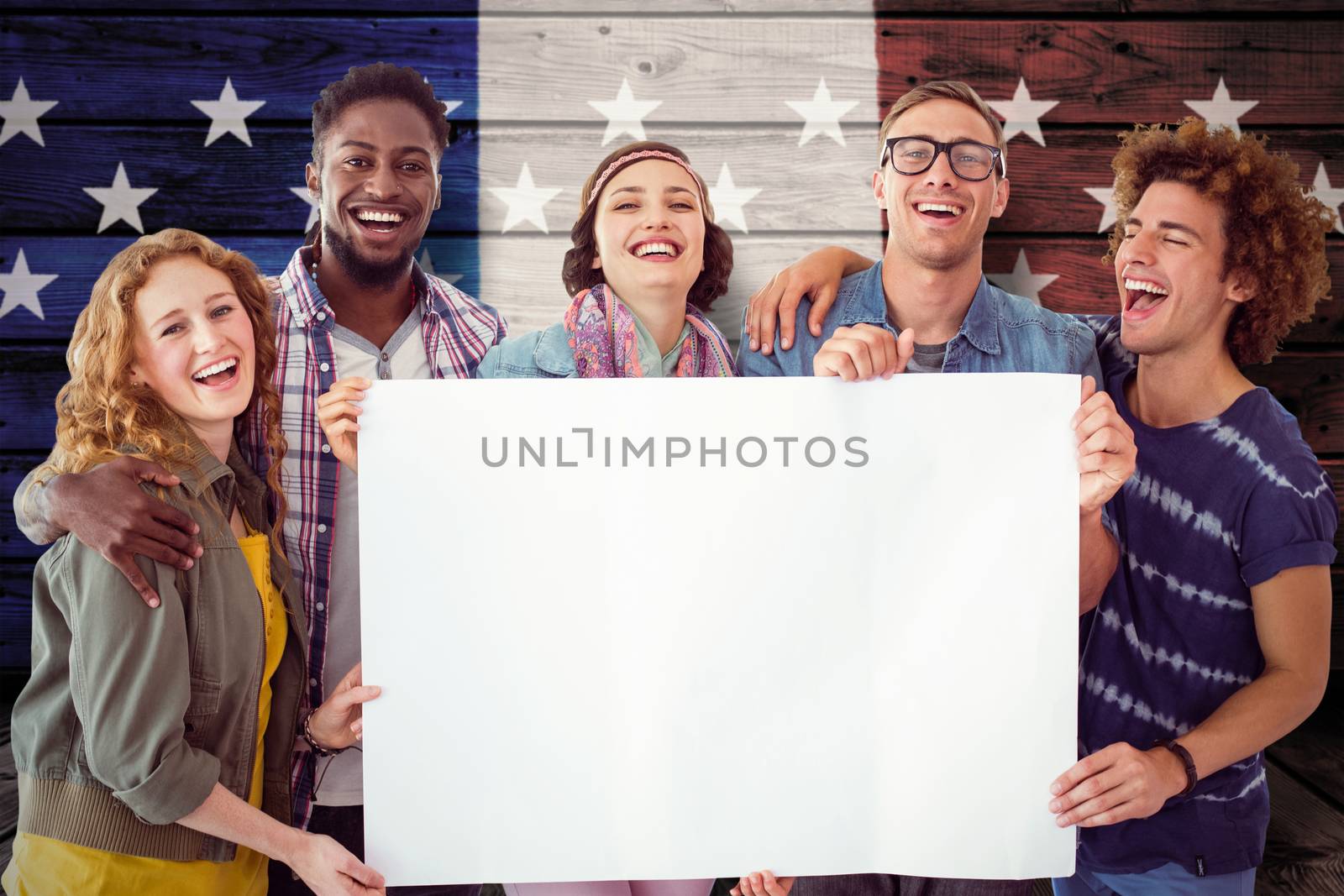 Fashion students smiling at camera together against composite image of usa national flag